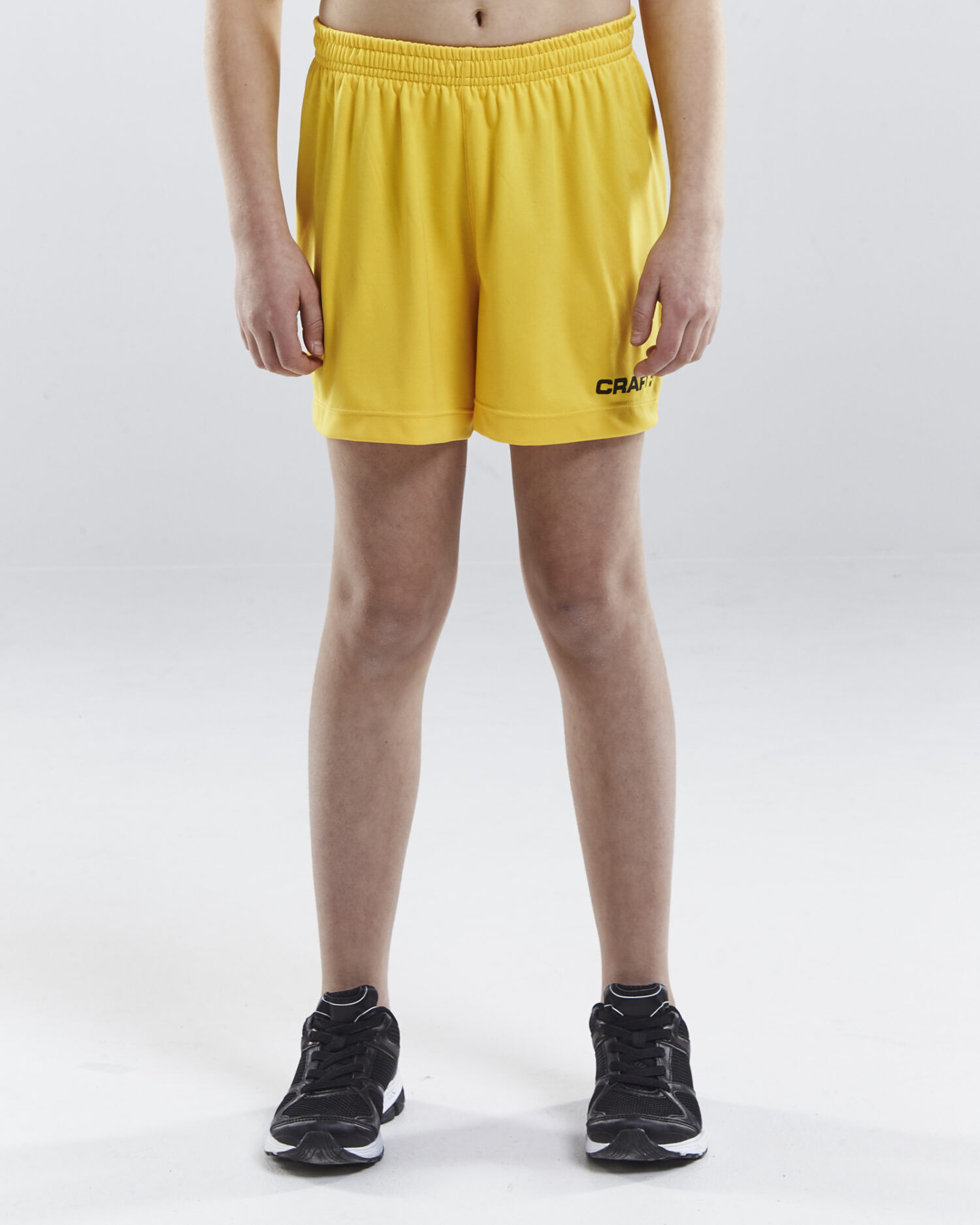 Craft Squad Go Short Solid Jr 1905586 Sweden Yellow