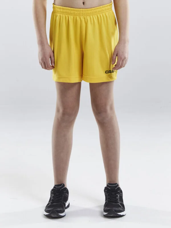 Craft Squad Go Short Solid Jr 1905586 Sweden Yellow