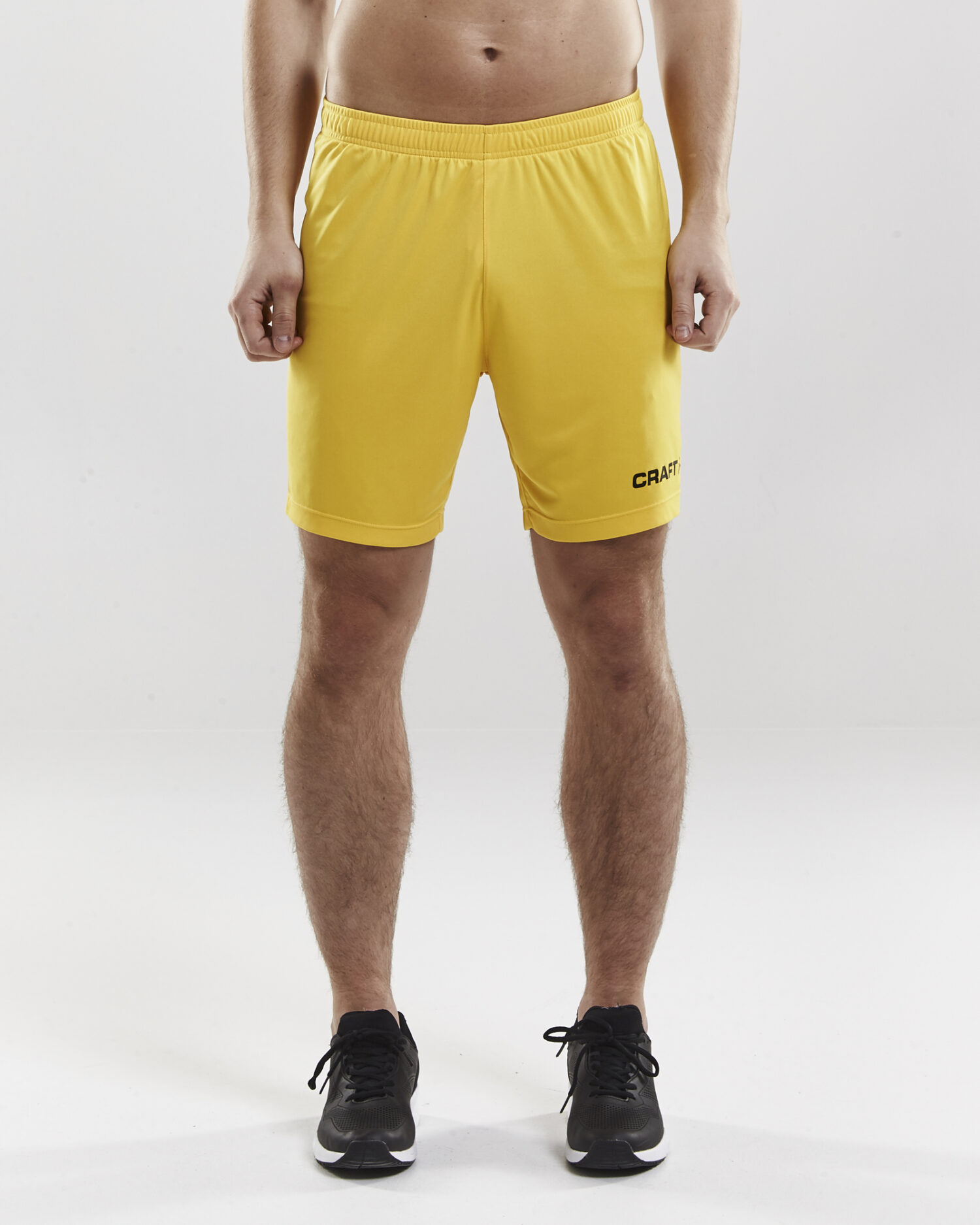 Craft Squad Go Short Solid M 1905572 Sweden Yellow