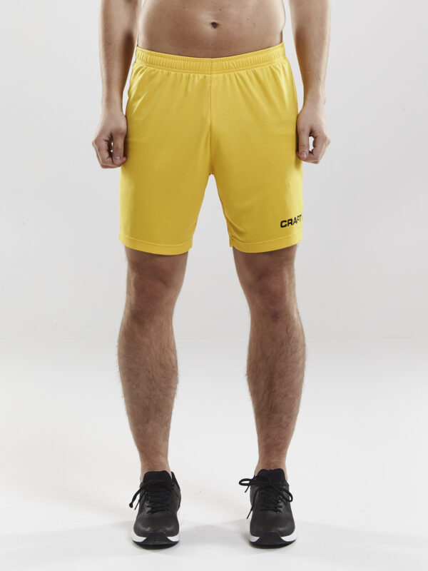 Craft Squad Go Short Solid M 1905572 Sweden Yellow