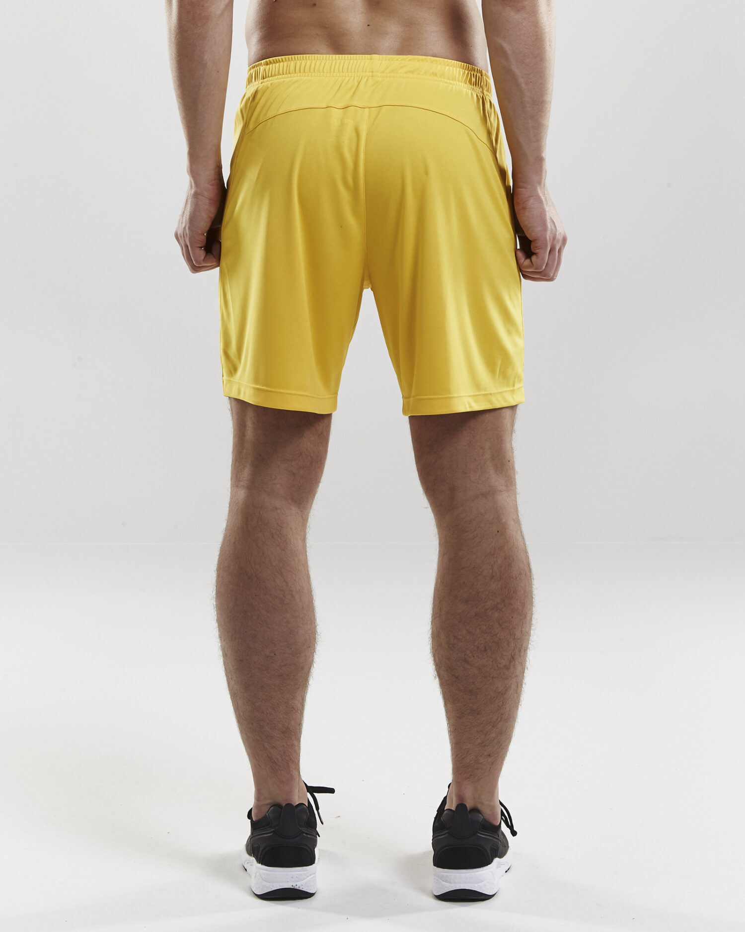 Craft Squad Go Short Solid M 1905572 Sweden Yellow