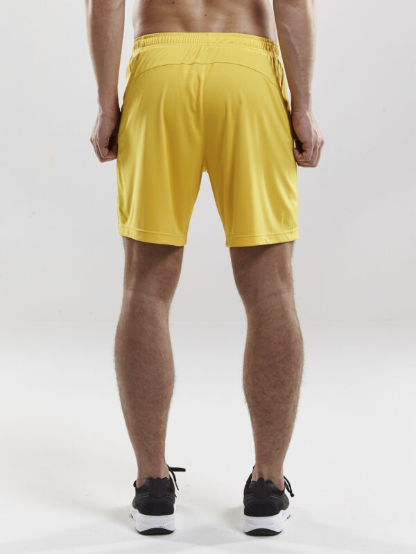 Craft Squad Go Short Solid M 1905572 Sweden Yellow